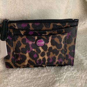 Coach brand, new, small pouch, animal, print, purple, black, brown.